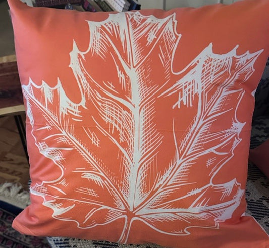 Orange pillow cover with large fall leaf